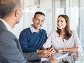 Couple at meeting with banking professional